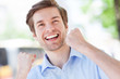 Happy Man With Fists Clenched
