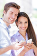 Couple with mobile phones