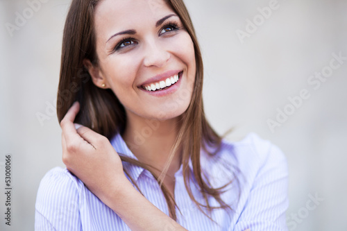 Photo: Attractive woman smiling Attractive woman smiling