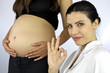 Happy doctor ok sign for pregnant woman
