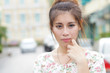 Photo: Young Asian woman outdoor portrait Young Asian woman outdoor portrait
