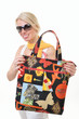 Woman with a bag and sunglasses