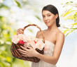 Foto: woman with basket full of flowers woman with basket full of flowers