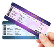 fly air tickets holded by hand