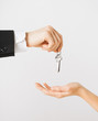 man and woman with house keys