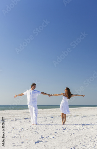 Photo: Man Woman Couple Dancing on Empty Beach Man Woman Couple Dancing on Empty Beach