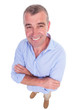 casual middle aged man with hands crossed