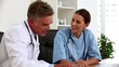 Doctors talking together in their office