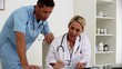 Doctors examining a document together