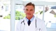Video: Doctor walking into focus and smiling Doctor walking into focus and smiling