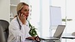 Busy doctor working at her desk
