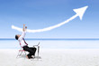 Photo: Businessman laughing looking at success arrow sign Businessman laughing looking at success arrow sign