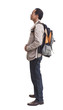side view of backpacker standing on white