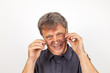 portrait of handsome man with reading glasses