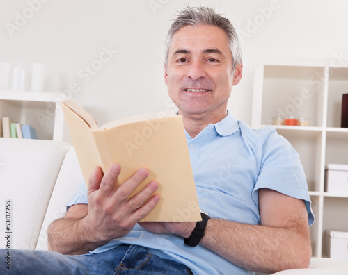 Photo: Mature Man Reading Book Mature Man Reading Book