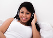 Woman Listening To Music On Headphones
