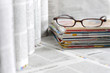 Newspapers and magazines blurred background concept