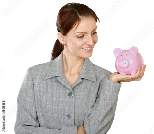 Photo: Young beautiful woman standing with piggy bank (money box) Young beautiful woman standing with piggy bank (money box)
