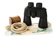 Photo: Black modern binoculars with map of adventure isolated on white Black modern binoculars with map of adventure isolated on white