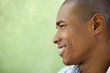 Photo: Portrait of happy young black man smiling Portrait of happy young black man smiling