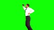 Businessman looking through binoculars while jumping