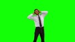 Businessman listening to music while jumping