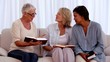 Retired friends studying the bible together