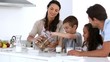 Mother offering cookies to her family