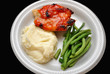 Healthy Chicken Dinner Over Black