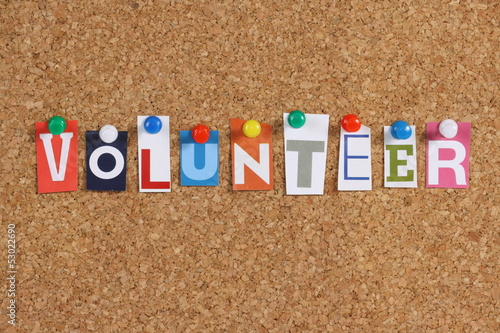 Photo: The word Volunteer on a cork notice board The word Volunteer on a cork notice board