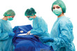 Below view of surgeons holding medical instruments in hands