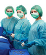 Below view of surgeons holding medical instruments in hands