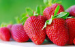 fresh strawberry on the clean green background