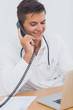 Attractive doctor on the phone