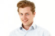 Naughty smile, young man with amused look