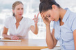 Businesswoman arguing with a colleague
