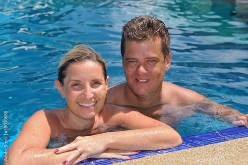 Photo: happy young couple at summer vacation have fun and relax at bea happy young couple at summer vacation have fun and relax at bea