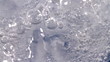 Pouring sparkling water into glass of ice cubes. Filmed at 50 fp