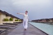 Photo: young woman relax on cloudy summer day young woman relax on cloudy summer day