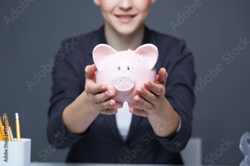 Photo: Showing piggy bank Showing piggy bank
