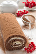 Photo: Chocolate roll with cream. Chocolate roll with cream.