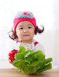 Little asian girl and vegetables