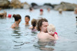 Father and his kid relaxing in hot spring