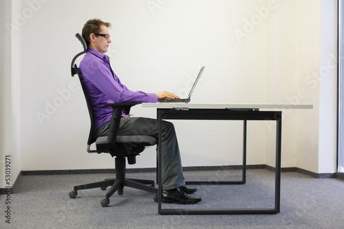 Photo: correct sitting position at laptop correct sitting position at laptop