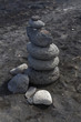 Black stone Inukshuk