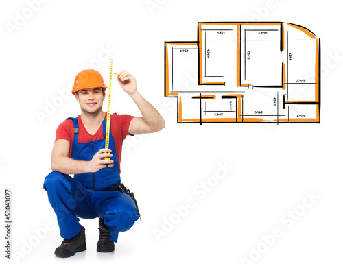 Photo: professional handyman drawing plan with marker professional handyman drawing plan with marker