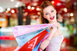 Foto: woman with shopping bags at shop woman with shopping bags at shop
