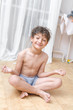 Boy Indoors Meditating