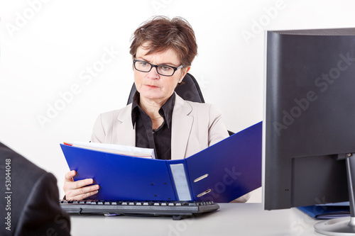 Photo: Business woman with folder Business woman with folder