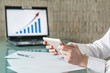 Businesswoman holding tablet